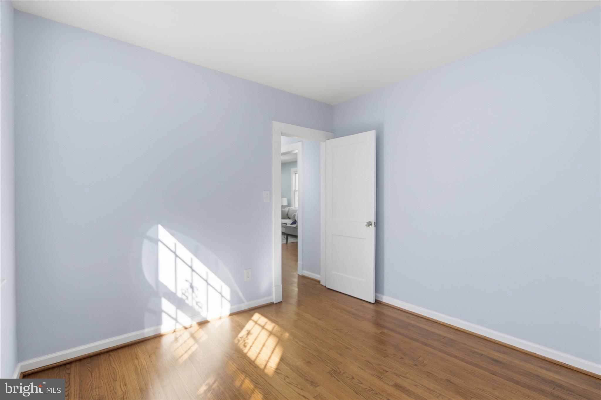 4029 Gault Place Northeast Washington, DC 20019 - Photo 15 of 33 a view of an empty room and wooden floor