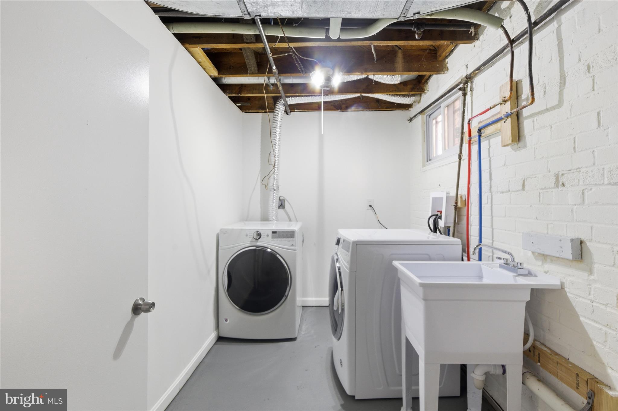 4029 Gault Place Northeast Washington, DC 20019 - Photo 27 of 33 a utility room with dryer and washer