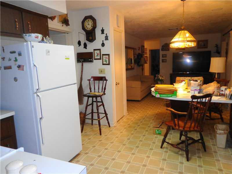 621 Southwest 75th Avenue Plantation, FL 33317 - Photo 12 of 20 a dining room with furniture and a kitchen view