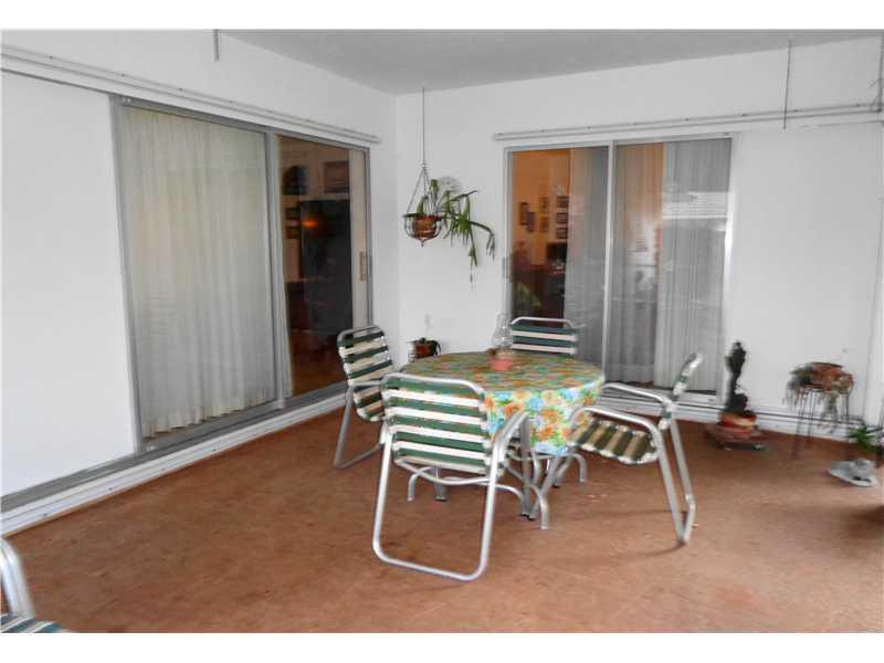 621 Southwest 75th Avenue Plantation, FL 33317 - Photo 16 of 20 a dining room with furniture and wooden floor