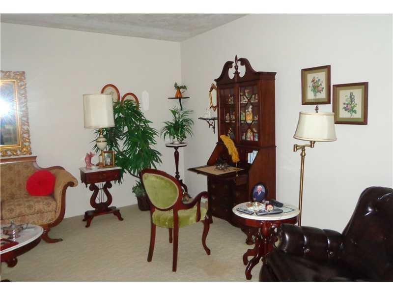 621 Southwest 75th Avenue Plantation, FL 33317 - Photo 3 of 20 a living room with furniture and chandelier