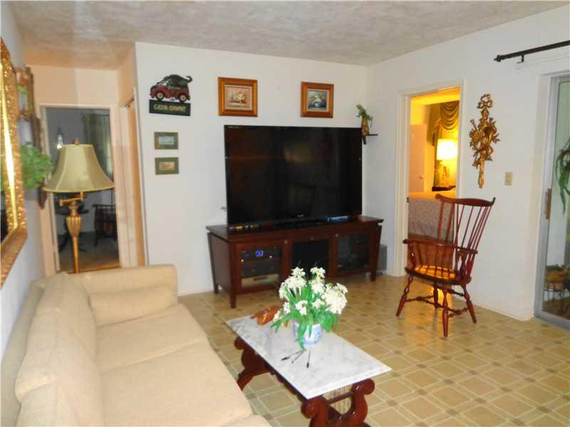 621 Southwest 75th Avenue Plantation, FL 33317 - Photo 9 of 20 a living room with furniture and a flat screen tv