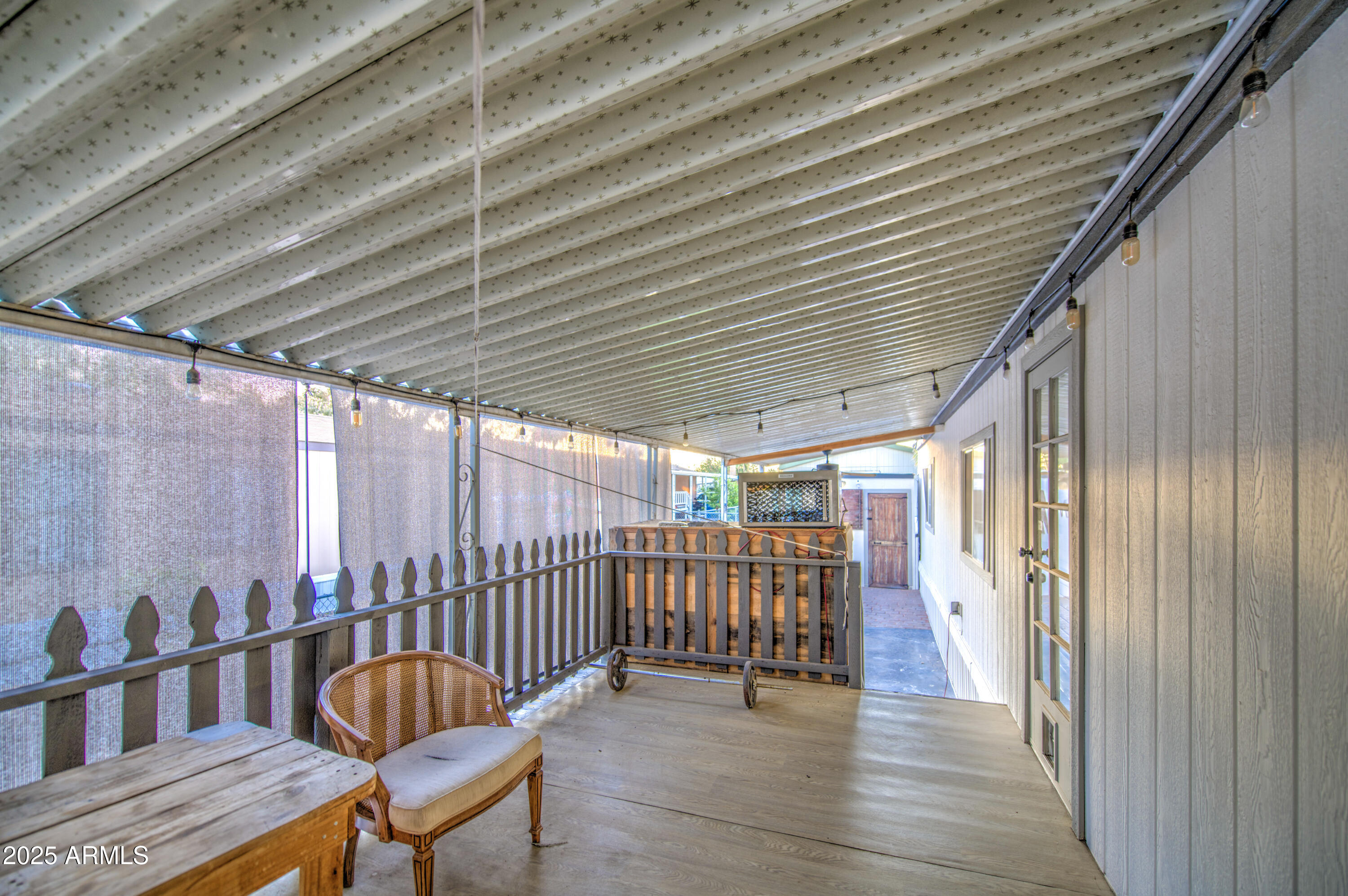 19401 North 7th Street, Unit 94 Phoenix, AZ 85024 - Photo 5 of 12 a view of a balcony with furniture