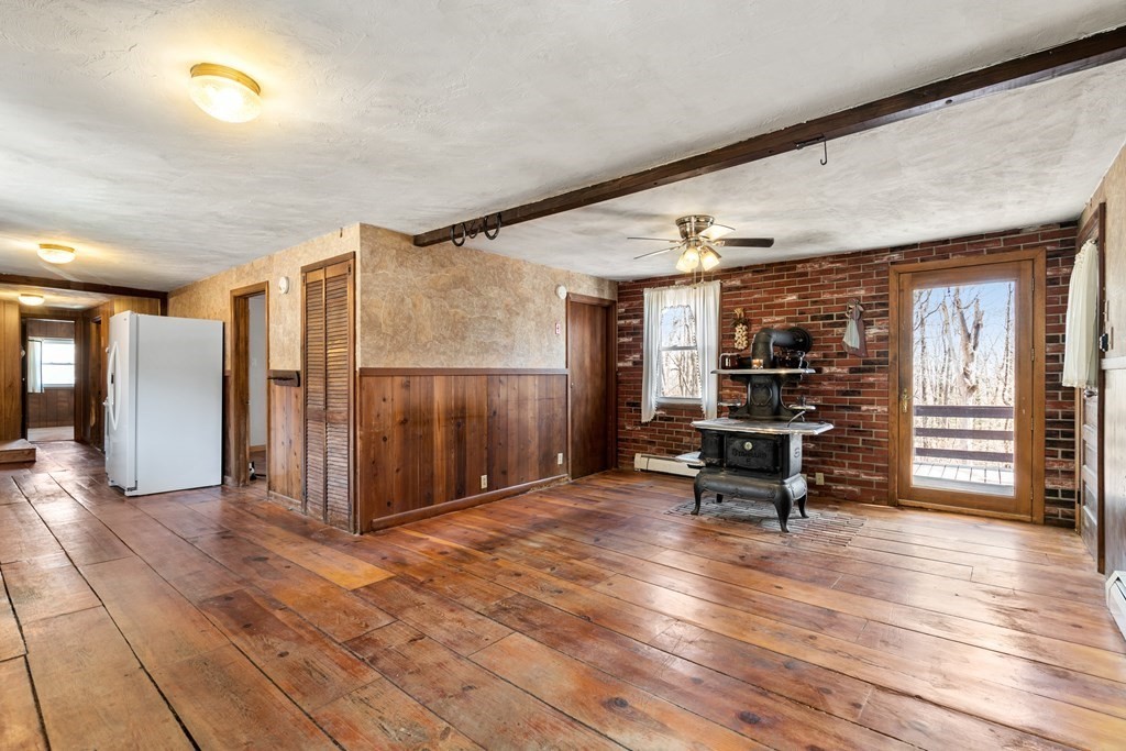 317 Leadmine Road Sturbridge, MA 01566 - Photo 3 of 38 a view of a livingroom with wooden furniture