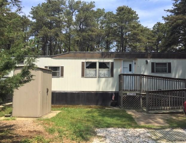 79 Spring Brook Road Wellfleet, MA 02667 - Photo 2 of 18 front mobil home with shed