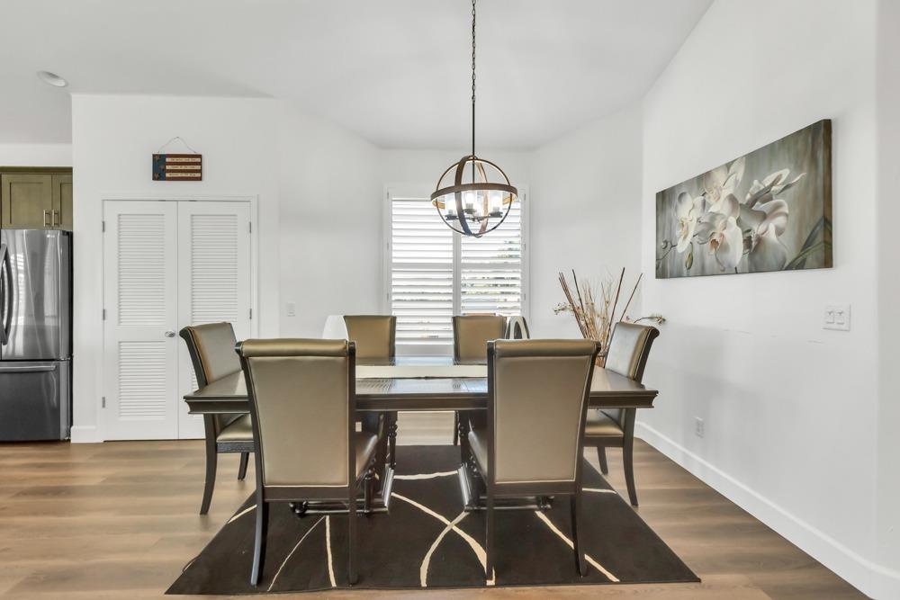 32852 South River Road Clarksburg, CA 95612 - Photo 12 of 72 a view of a dining room with furniture window and wooden floor