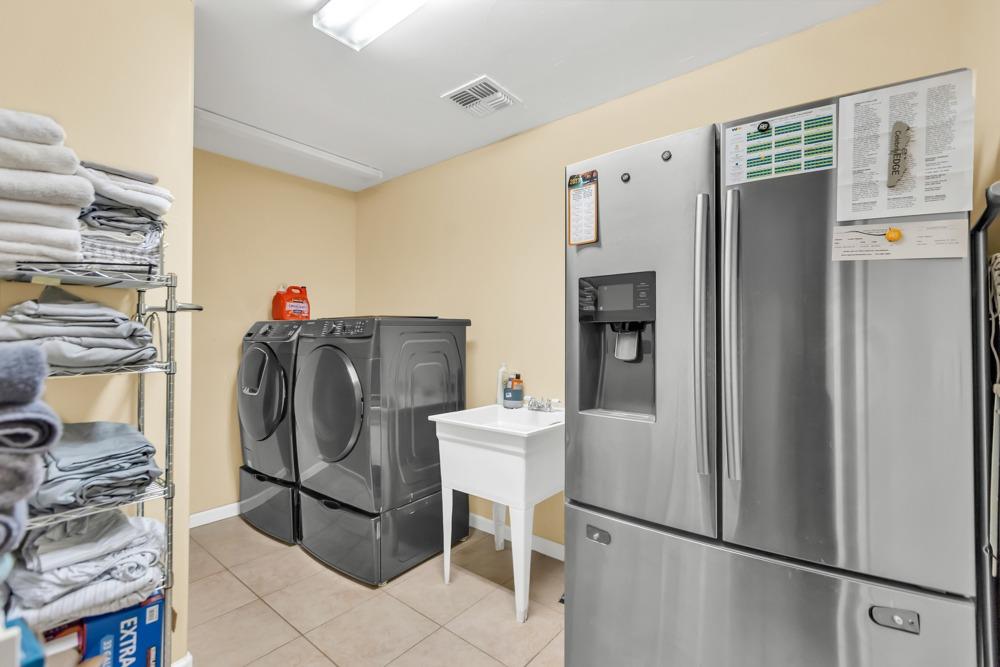 32852 South River Road Clarksburg, CA 95612 - Photo 33 of 72 a utility room with closet dryer and washer