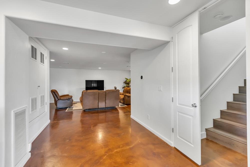 32852 South River Road Clarksburg, CA 95612 - Photo 34 of 72 a living room with furniture and a flat screen tv
