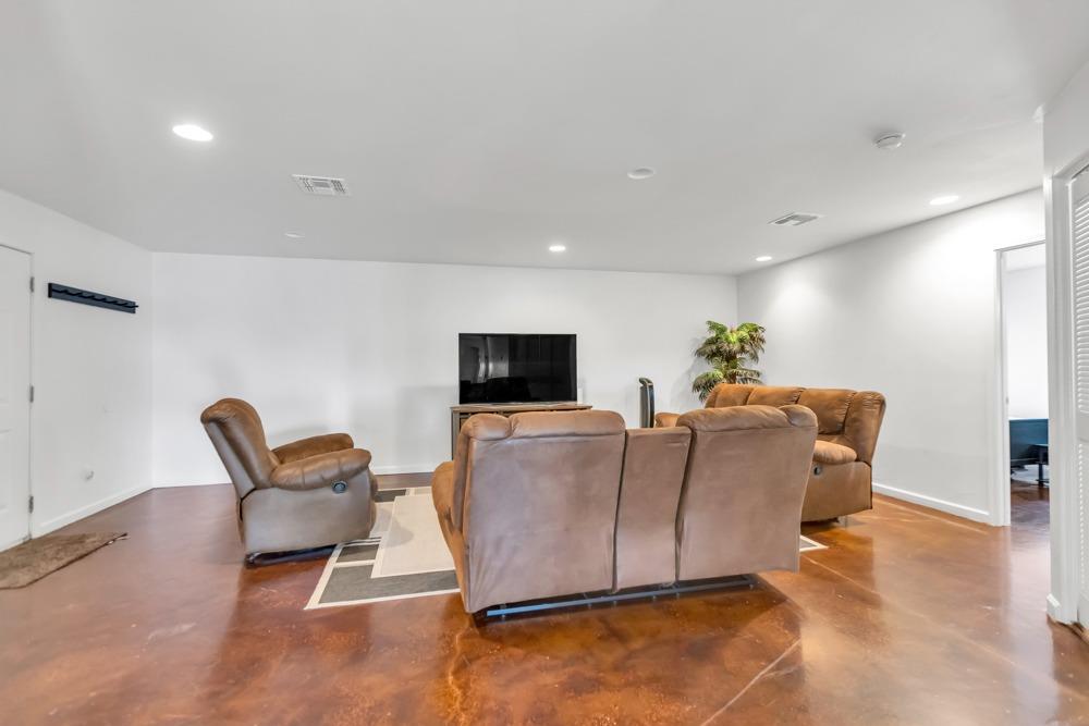 32852 South River Road Clarksburg, CA 95612 - Photo 35 of 72 a living room with furniture and a flat screen tv