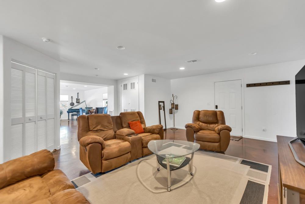 32852 South River Road Clarksburg, CA 95612 - Photo 38 of 72 a living room with furniture and a wooden floor