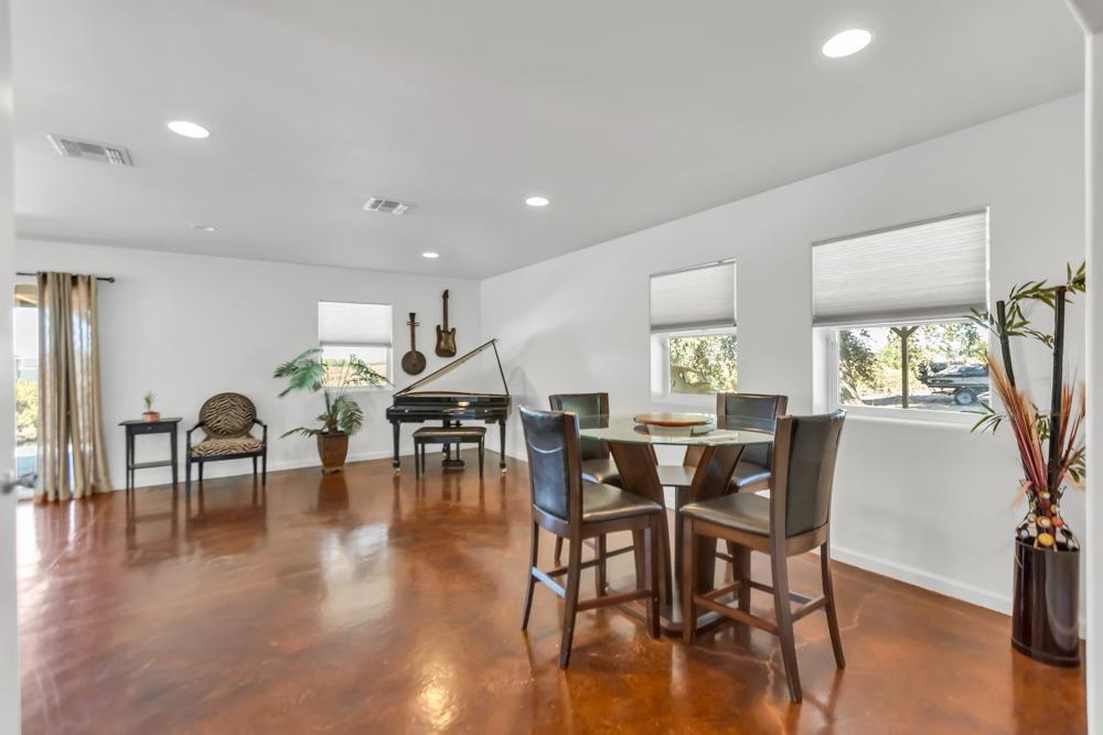 32852 South River Road Clarksburg, CA 95612 - Photo 42 of 72 a view of a dining room with furniture and wooden floor