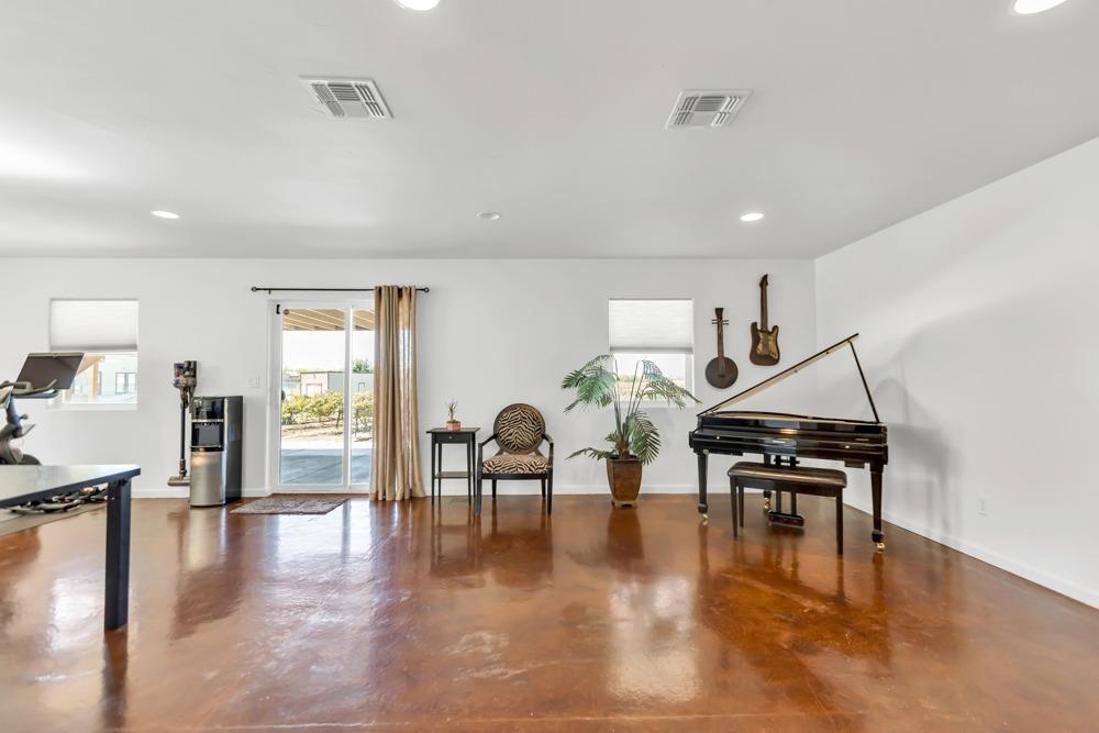32852 South River Road Clarksburg, CA 95612 - Photo 43 of 72 a living room with furniture and wooden floor