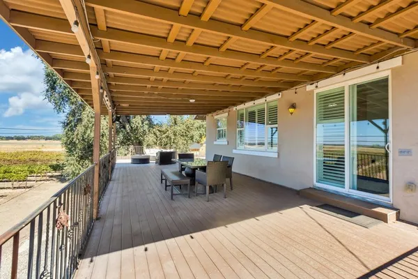 a view of a yard with an outdoor space
