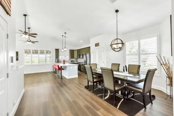 a bedroom with a bed and a chair