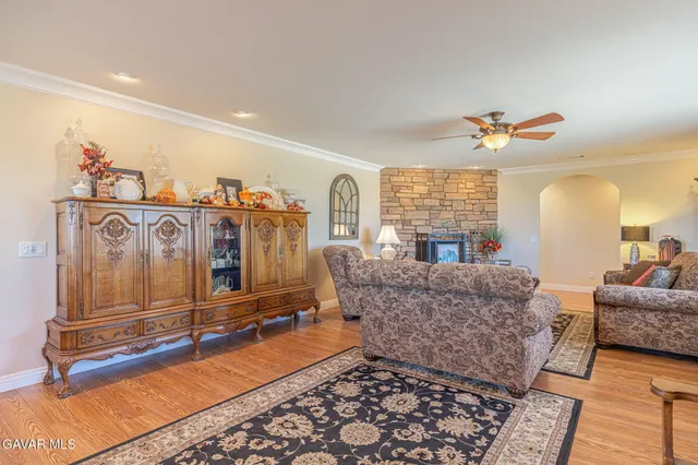 a living room with furniture and a rug