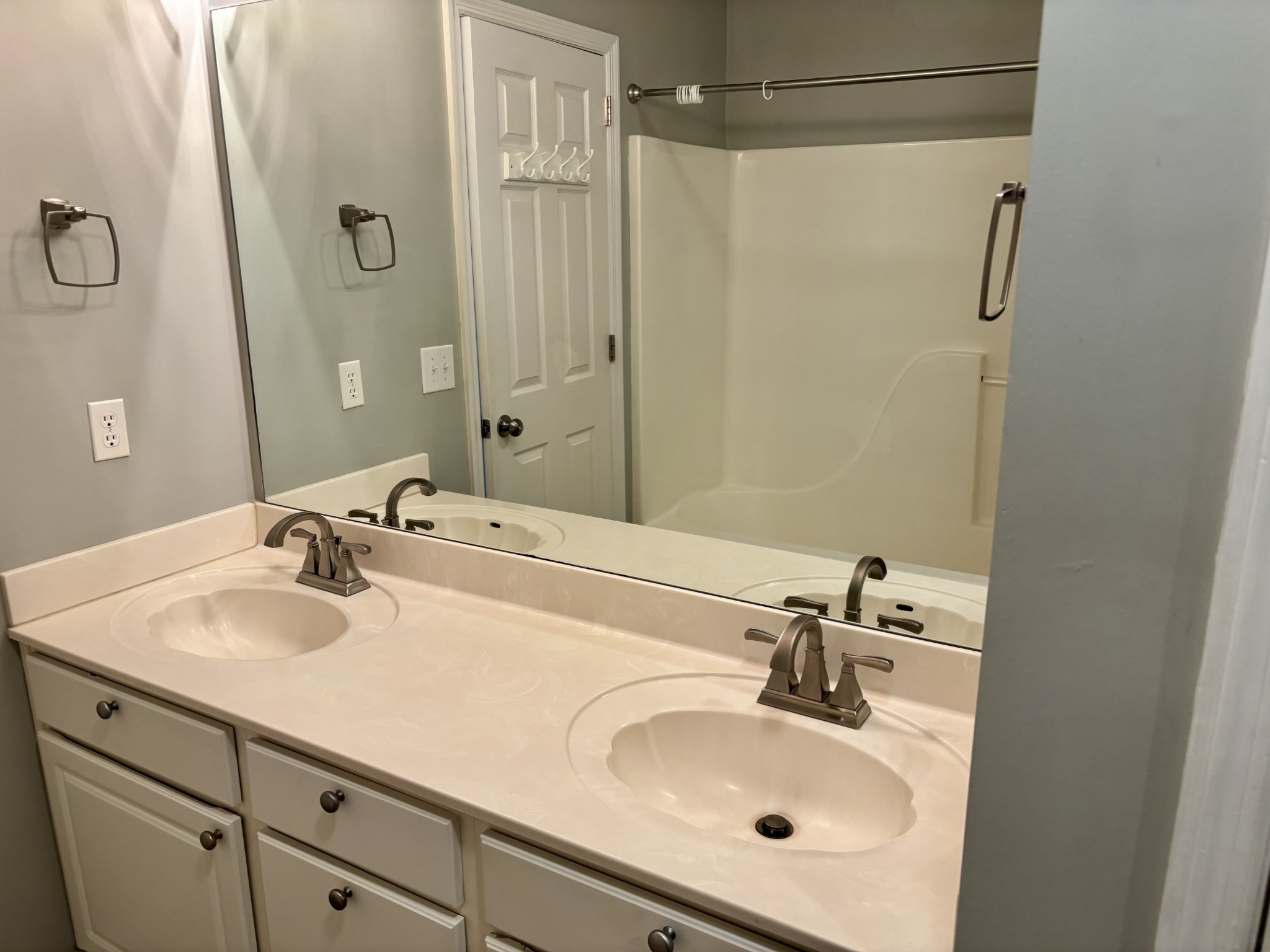 409 Compton Lane Franklin, TN 37069 - Photo 12 of 23 a bathroom with a sink and a mirror