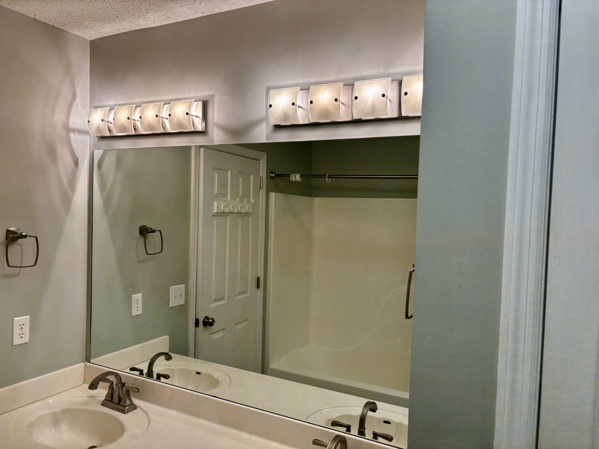409 Compton Lane Franklin, TN 37069 - Photo 13 of 23 a bathroom with a sink and a mirror