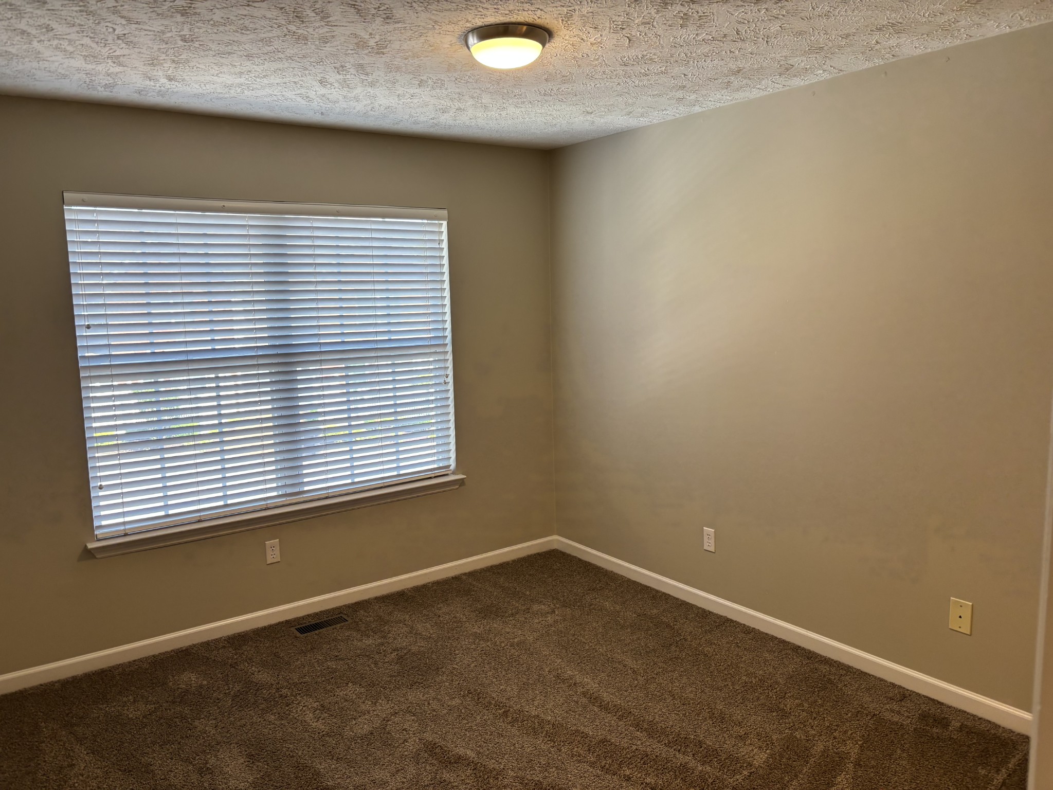 409 Compton Lane Franklin, TN 37069 - Photo 14 of 23 an empty room with a window