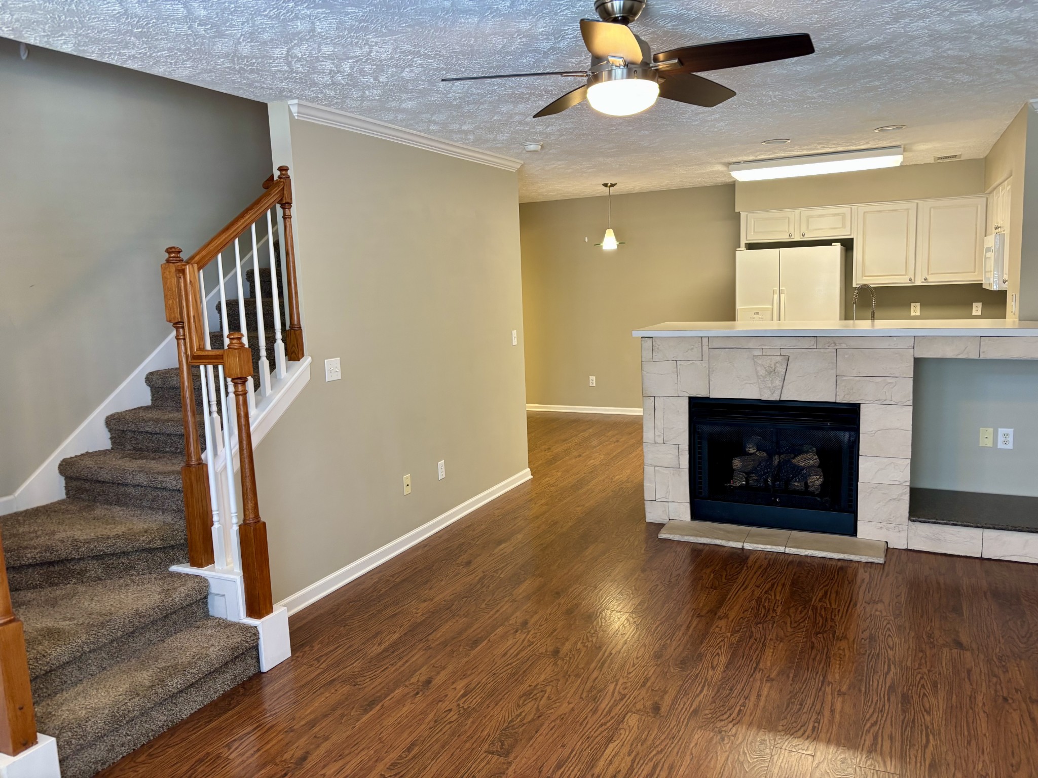 409 Compton Lane Franklin, TN 37069 - Photo 2 of 23 a view of an empty room wooden floor and fire place