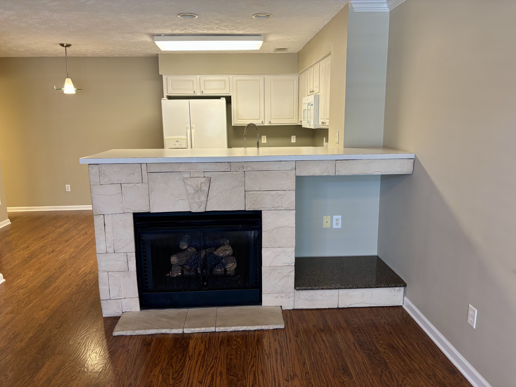 409 Compton Lane Franklin, TN 37069 - Photo 3 of 23 a room with a fireplace and a fireplace