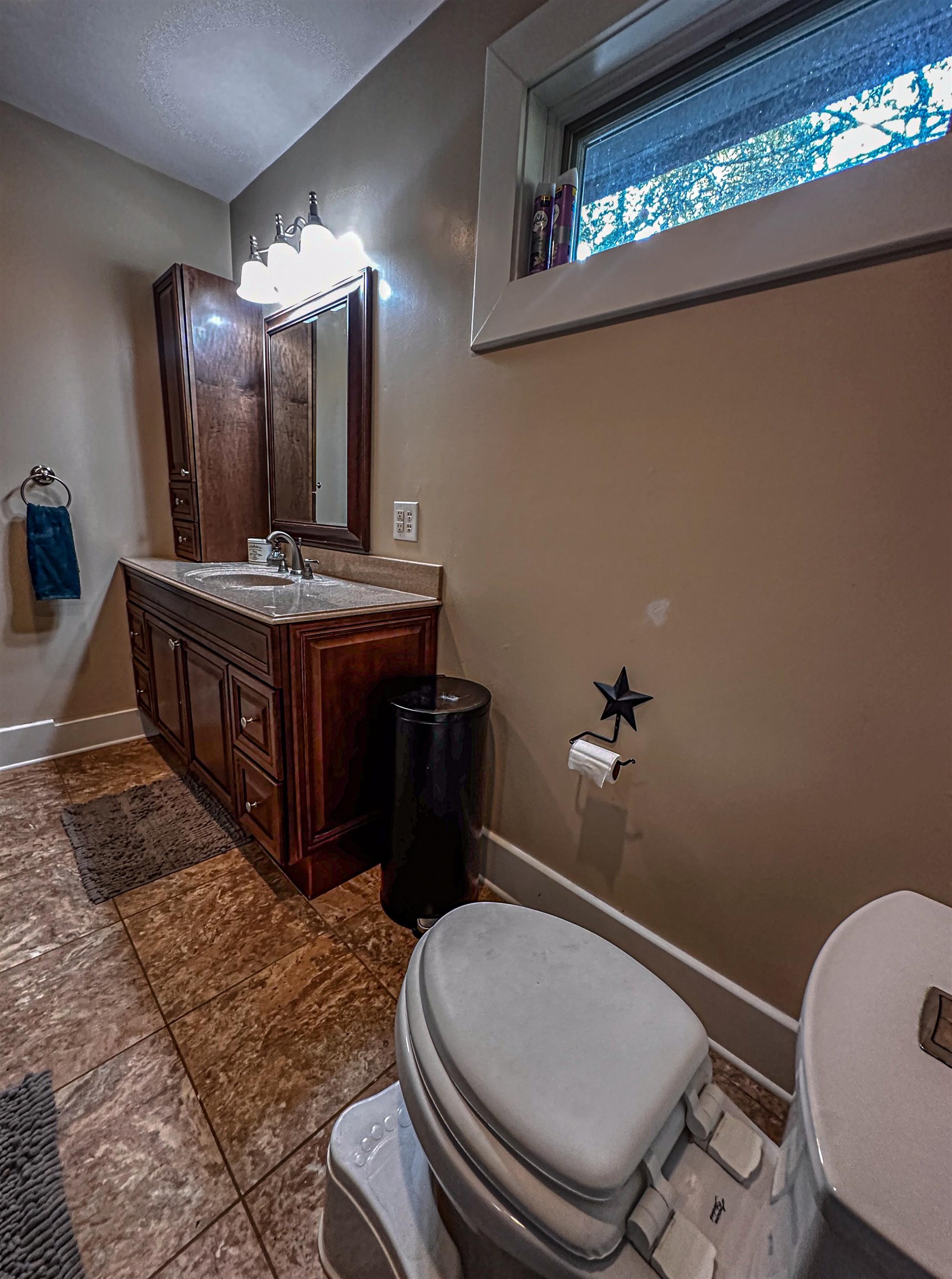 19 Mt Hermon Road Middlebrook, VA 24459 - Photo 51 of 70 a bathroom with a granite countertop toilet sink and mirror