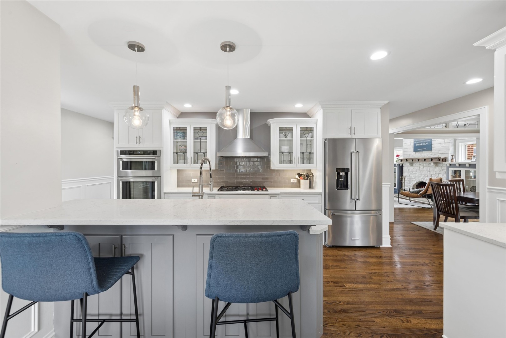 346 South Street Elmhurst, IL 60126 - Photo 14 of 43 a large kitchen with stainless steel appliances kitchen island granite countertop a table and chairs in it