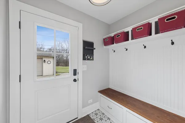 a hallway with washer and dryer