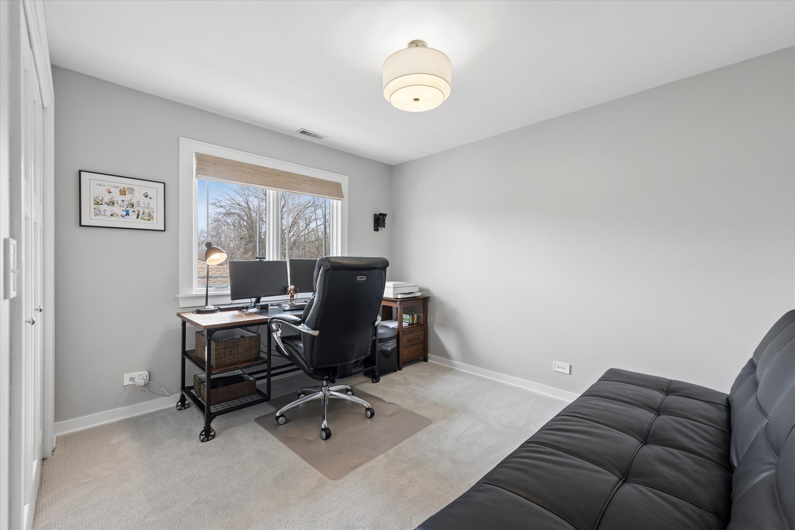 346 South Street Elmhurst, IL 60126 - Photo 25 of 43 a livingroom with workspace and a window