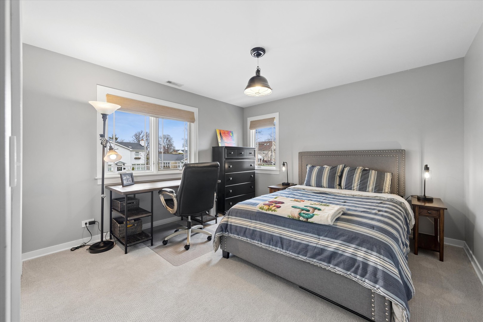 346 South Street Elmhurst, IL 60126 - Photo 27 of 43 a bedroom with a bed and a chandelier