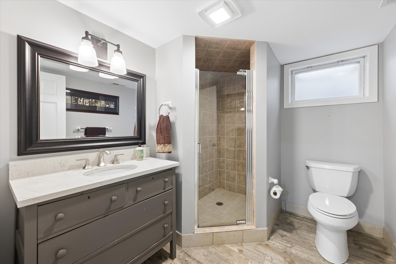 346 South Street Elmhurst, IL 60126 - Photo 35 of 43 a bathroom with a toilet sink and shower