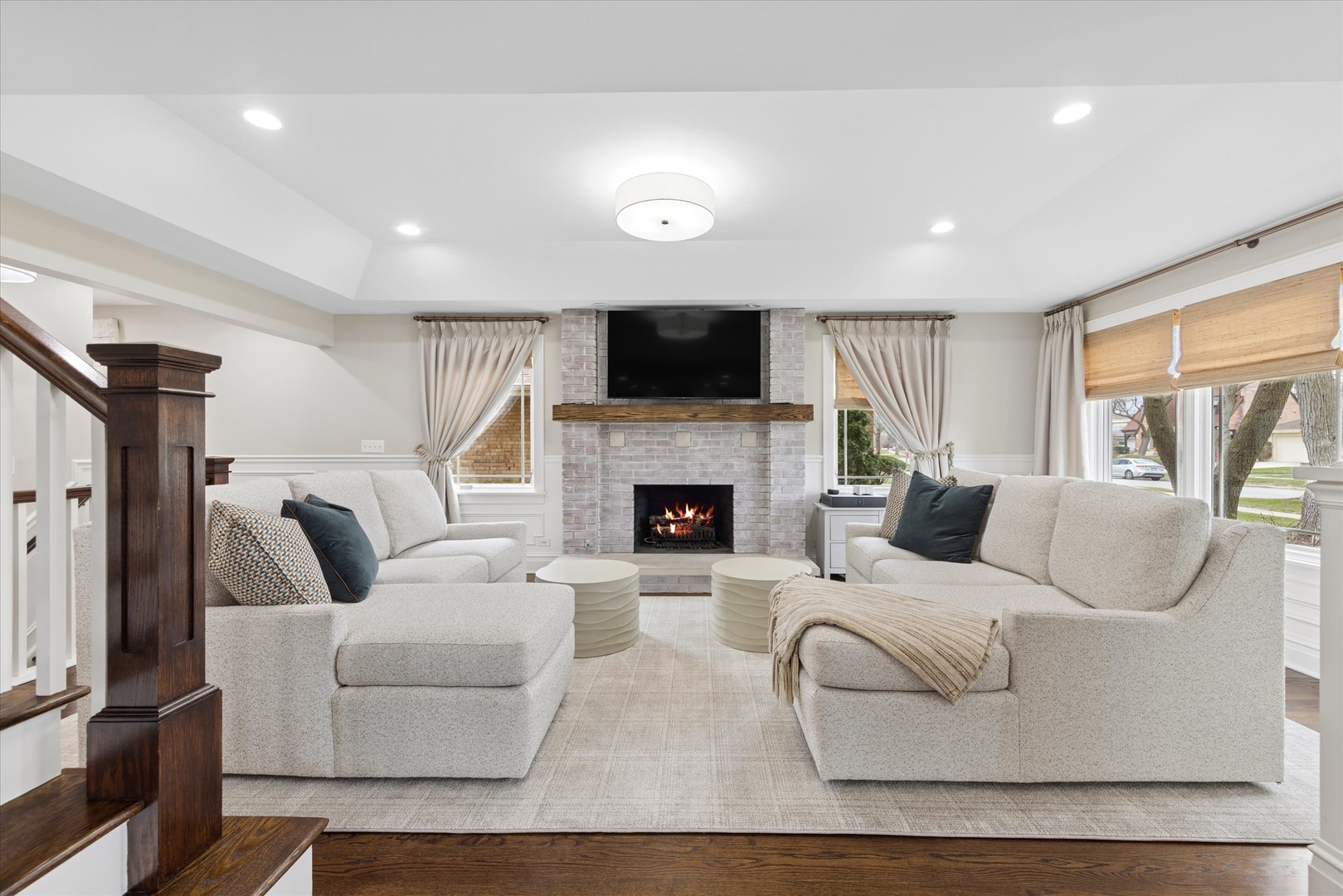 346 South Street Elmhurst, IL 60126 - Photo 5 of 43 a living room with furniture a flat screen tv and a fireplace