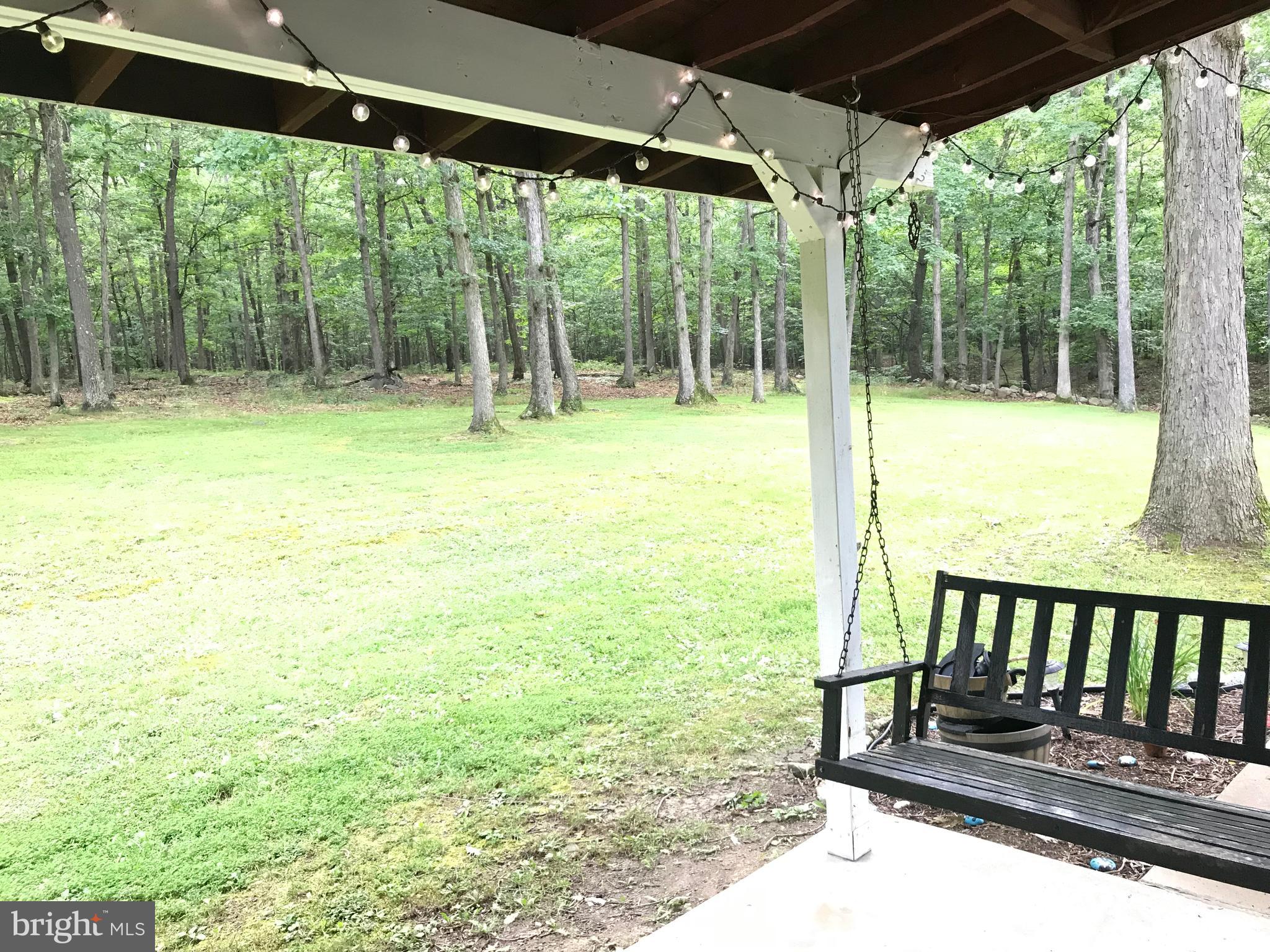23701 Rocky Ridge Road Rawlings, MD 21557 - Photo 12 of 55 Sit a spell on your back covered porch!