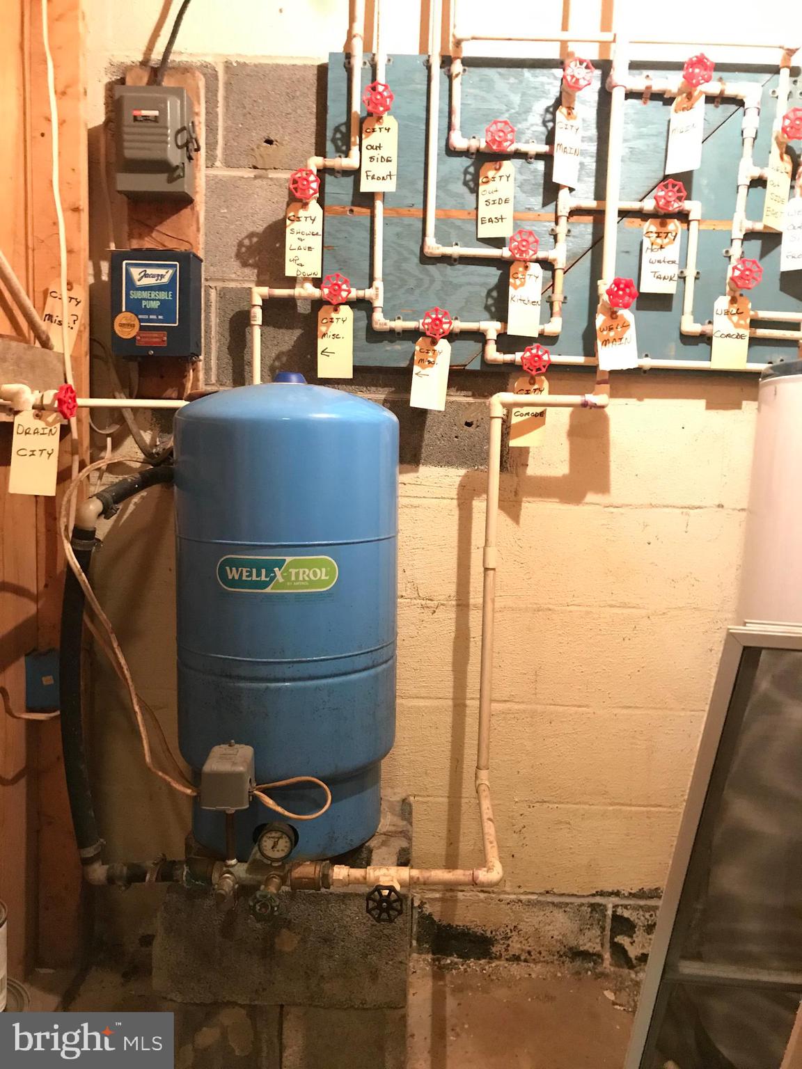 23701 Rocky Ridge Road Rawlings, MD 21557 - Photo 48 of 55 Lower level water eqt. PUBLIC WATER ALSO!!!