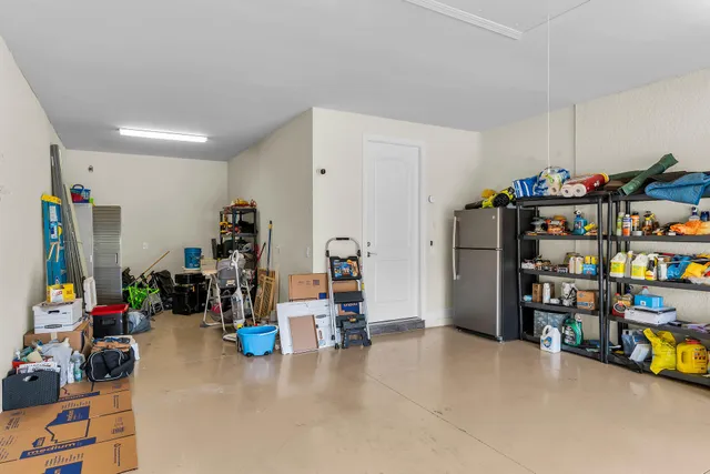 a kitchen with lots of counter top space and dining table
