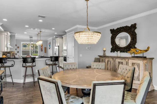 a bathroom with a granite countertop sink mirror and shower