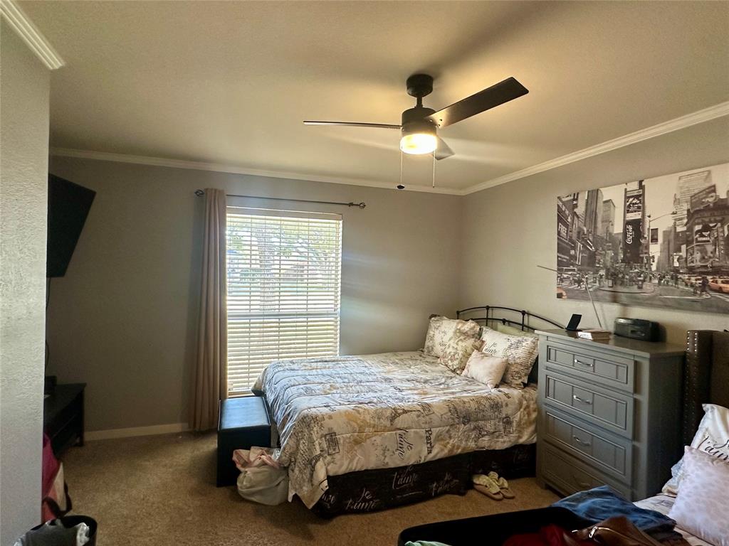 10504 Whitney Trace Drive Waco, TX 76708 - Photo 23 of 36 a bedroom with a bed and window