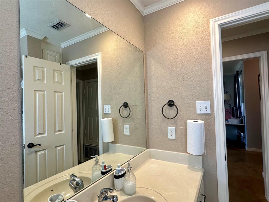 10504 Whitney Trace Drive Waco, TX 76708 - Photo 24 of 36 a bathroom with a sink a toilet and shower