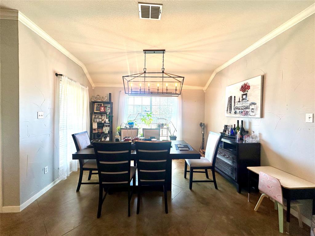 10504 Whitney Trace Drive Waco, TX 76708 - Photo 9 of 36 a view of a dining room with furniture window and outside view
