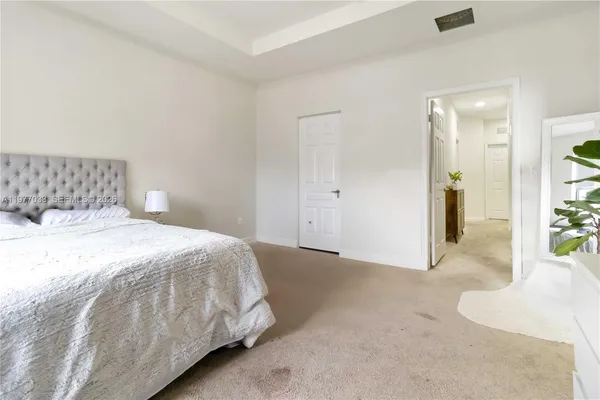 a bedroom with a bed and with table