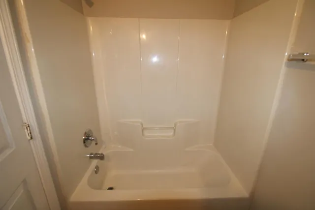 a bathroom with a bathtub