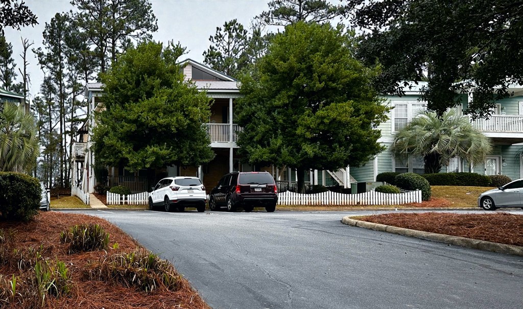 8082 Veterans Parkway, Unit 5 Columbus, GA 31909 - Photo 6 of 7 a view of street with parked cars