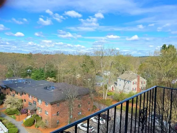 a view of a balcony with an ocean view