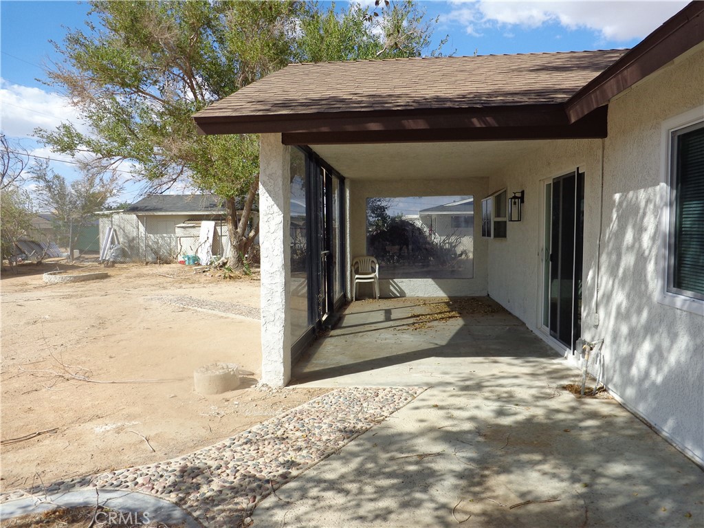 12744 Running Deer Road Apple Valley, CA 92308 - Photo 25 of 30 a view of a porch