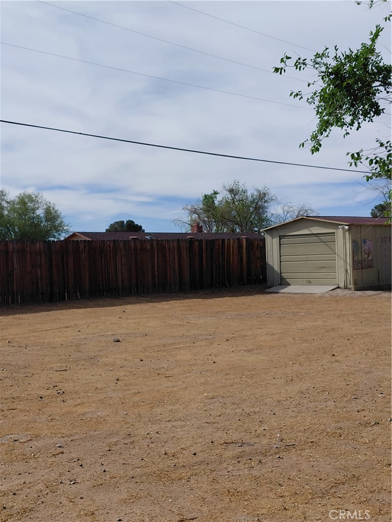 12744 Running Deer Road Apple Valley, CA 92308 - Photo 27 of 30 a view of a backyard