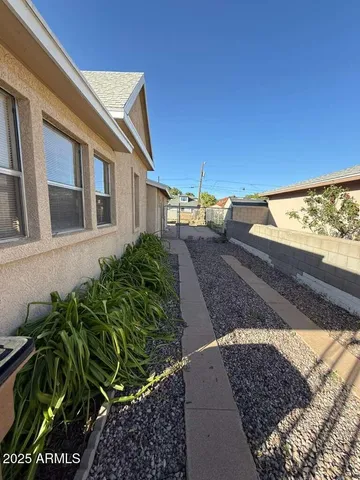 a view of a back yard of the house