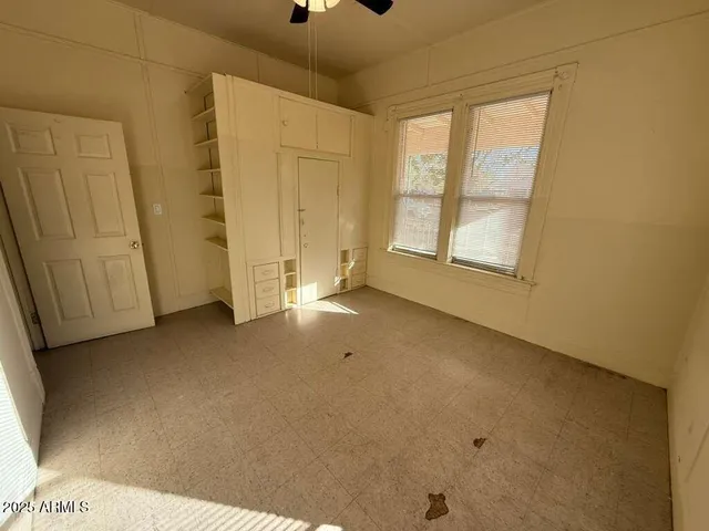 an empty room with windows