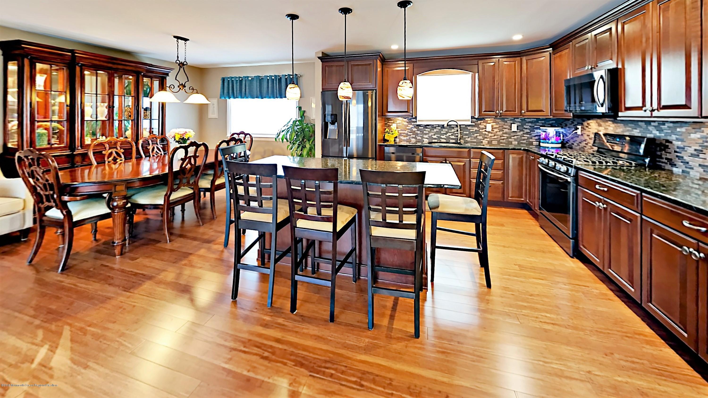 30 Netty Street Howell, NJ 07731 - Photo 3 of 24 a view of a dining room with furniture window and wooden floor
