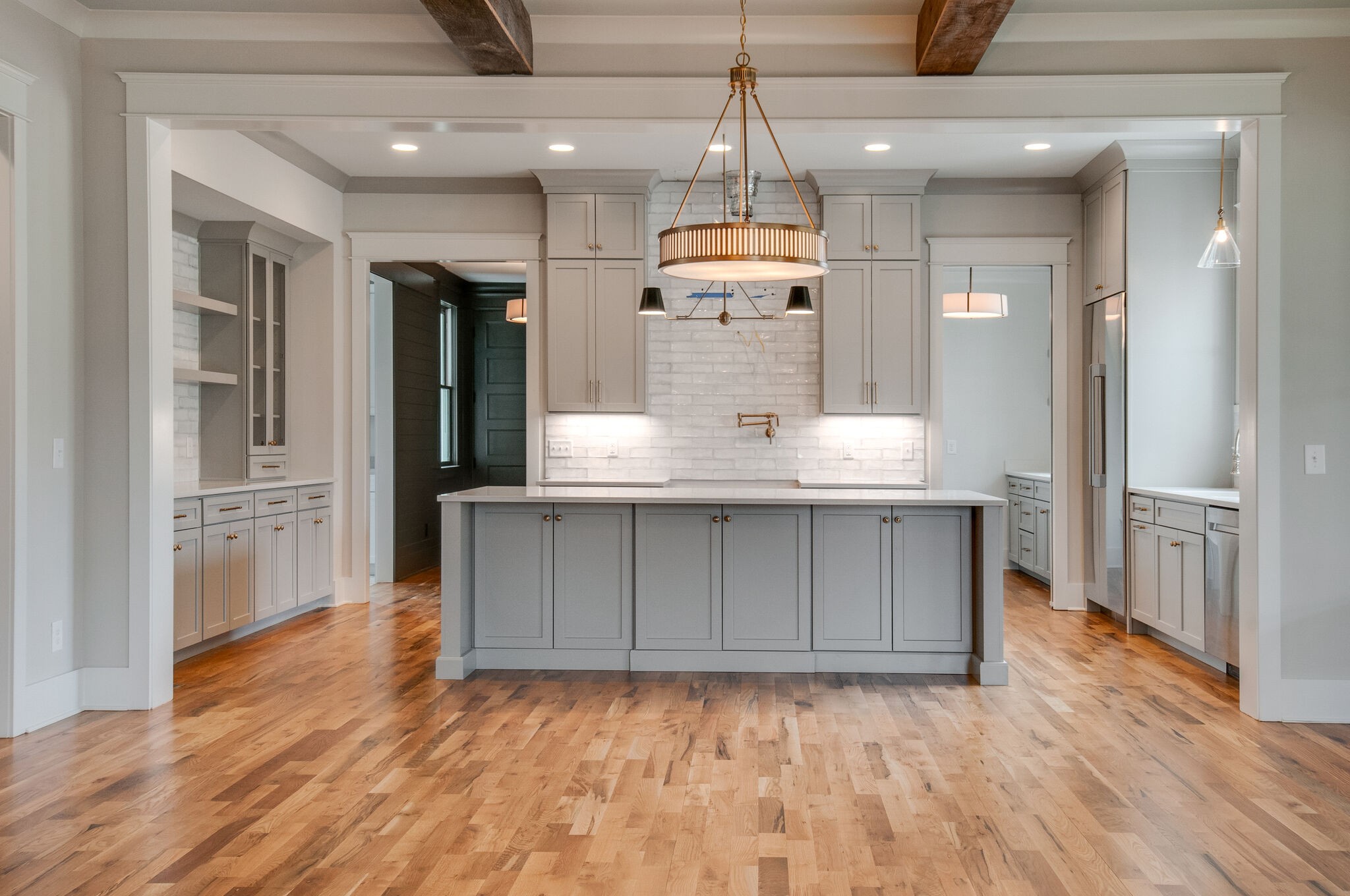 4510 Harpeth School Road Franklin, TN 37064 - Photo 15 of 43 a view of a kitchen with a sink and wooden floor