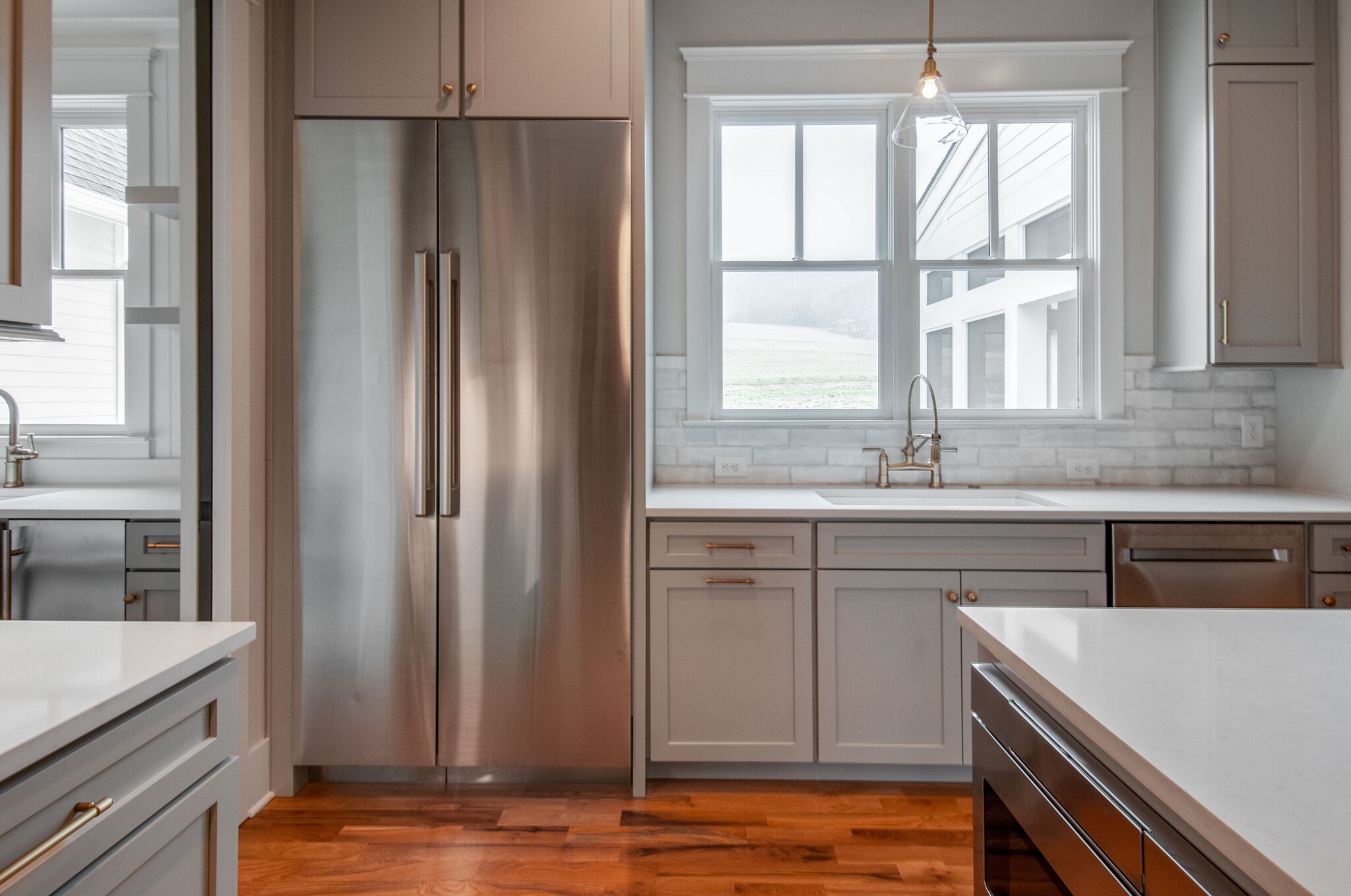 4510 Harpeth School Road Franklin, TN 37064 - Photo 17 of 43 a kitchen with stainless steel appliances granite countertop a refrigerator and a sink
