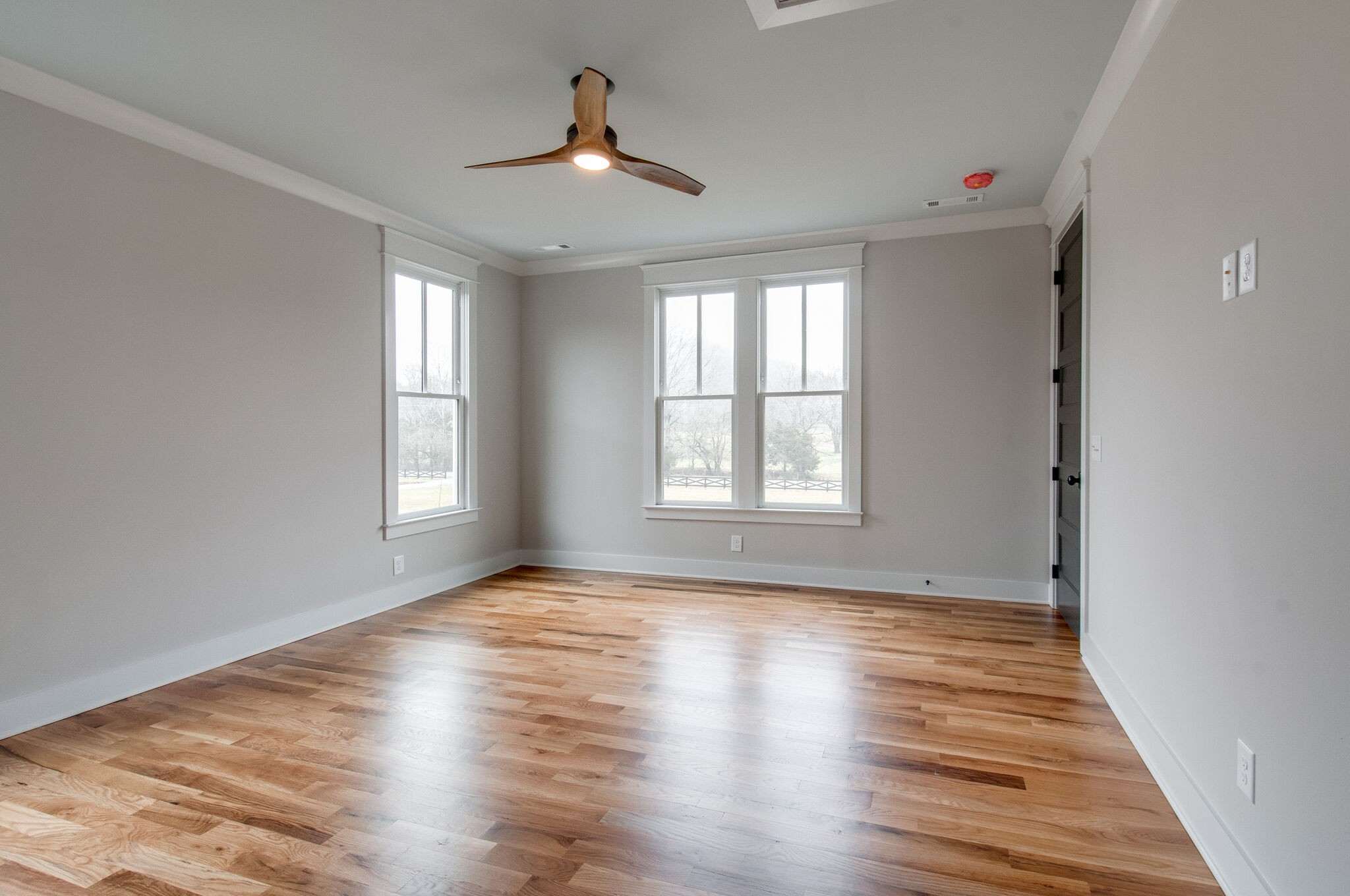 4510 Harpeth School Road Franklin, TN 37064 - Photo 38 of 43 a view of an empty room with wooden floor and a window